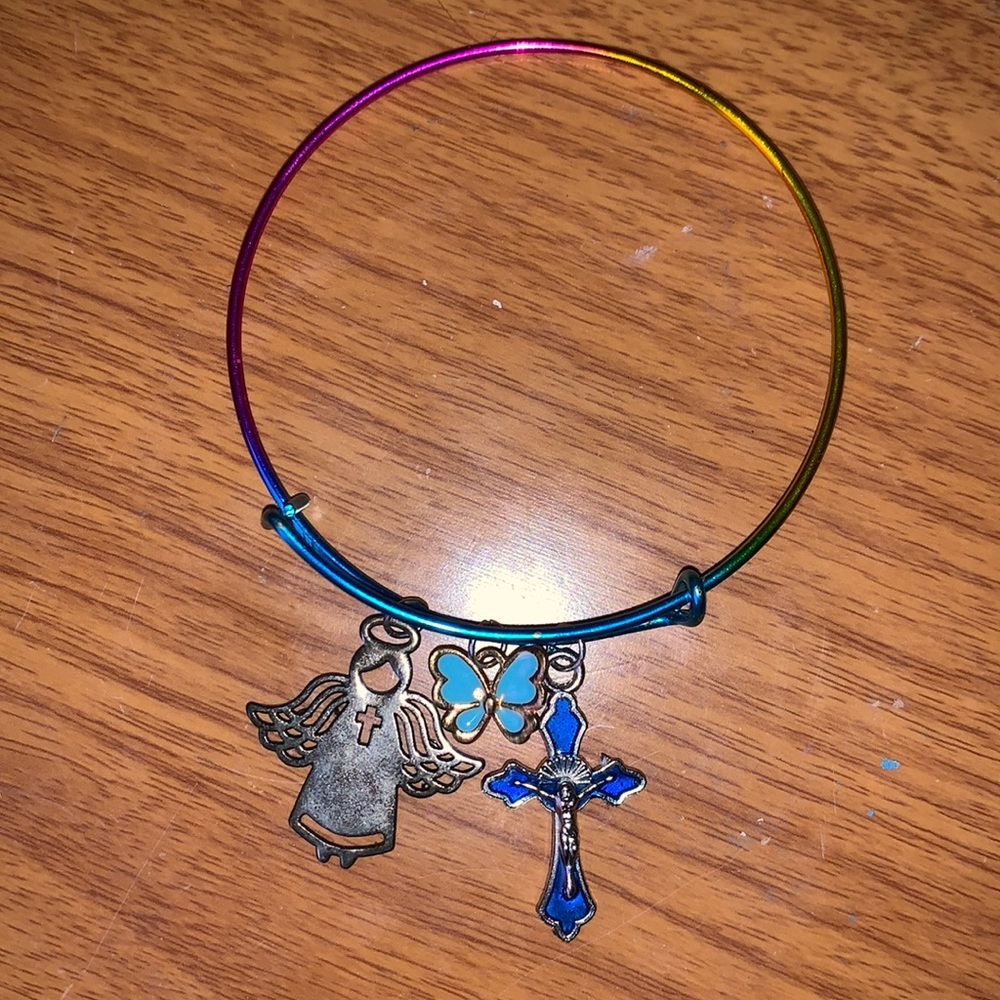 Bracelet, with angel,butterfly, and cross charm